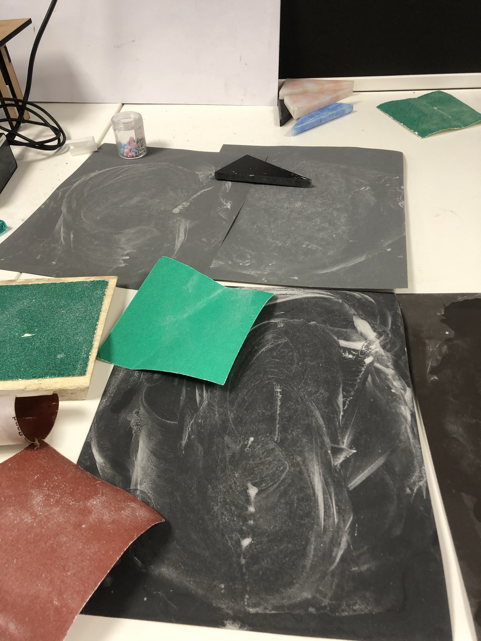 SMILE recycled plastic samples being wet sanded and buffed