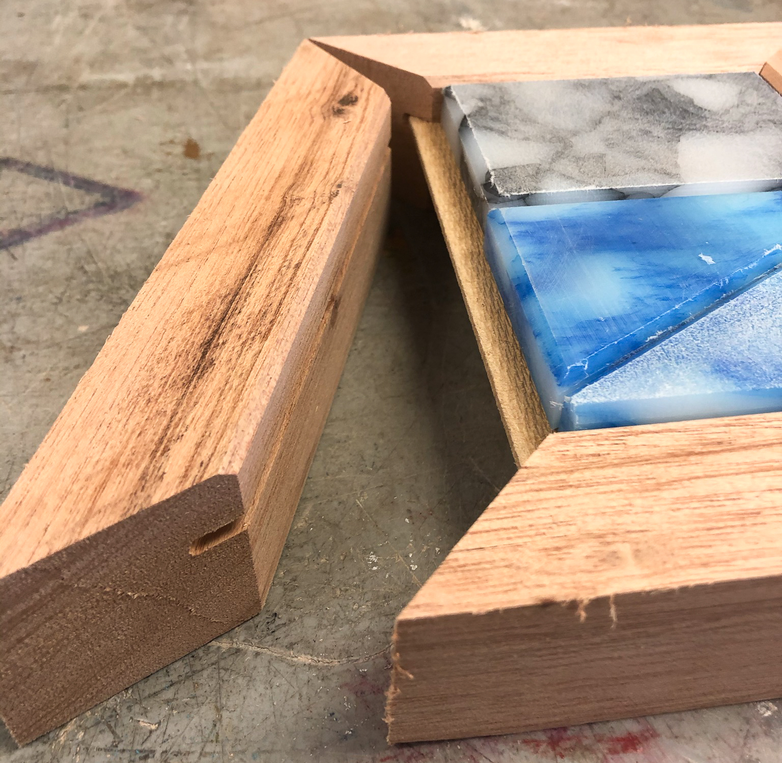 Mahogany panel frame with plastic insert — joinery detail