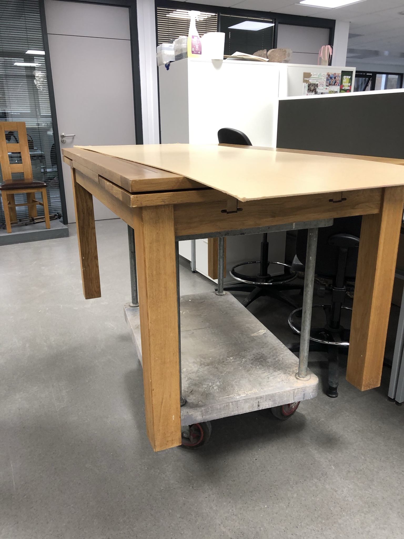 CANTI original oak table before upcycling — with plywood panel sheet
