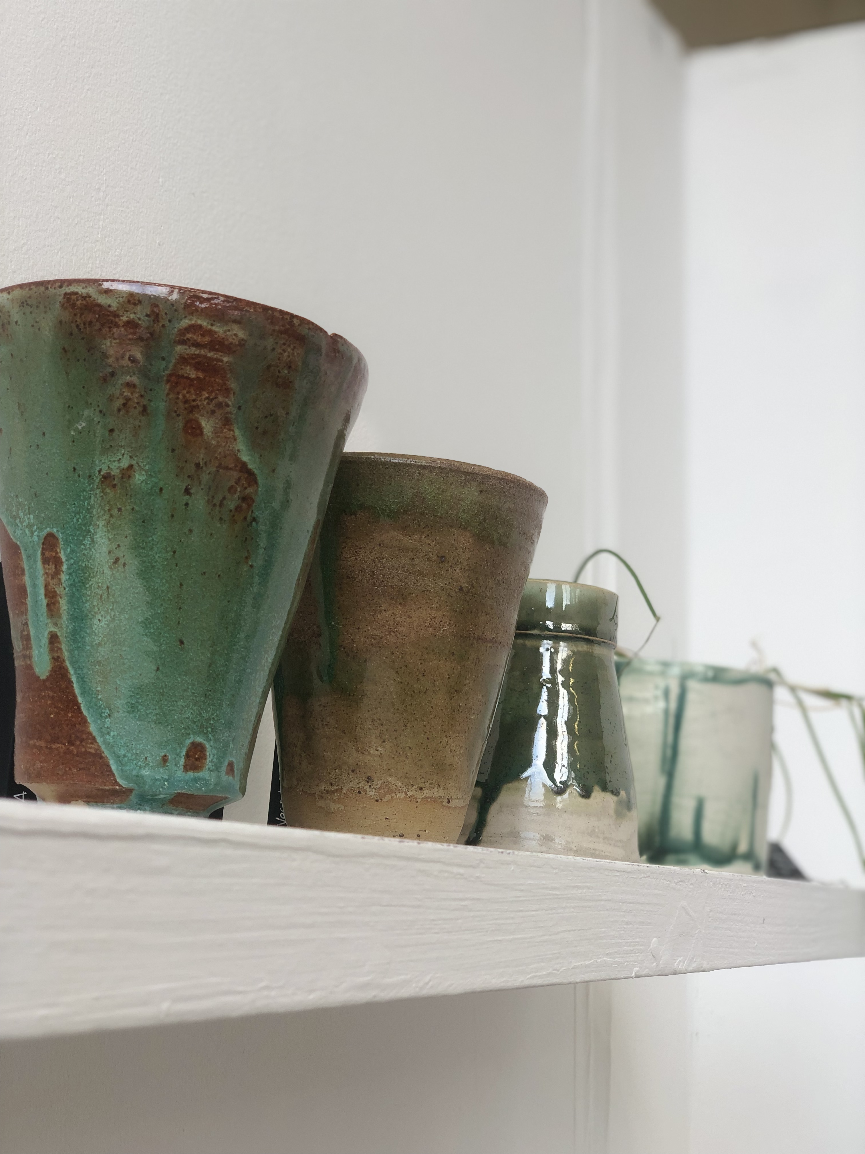 Display shelf detail from BLEND exhibition — individual ceramic piece during the Graduate in Residence